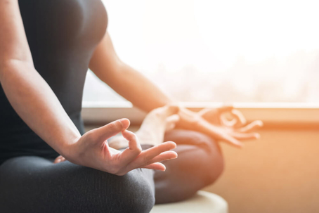 woman person in yoga lotus pose having spiritual meditating
