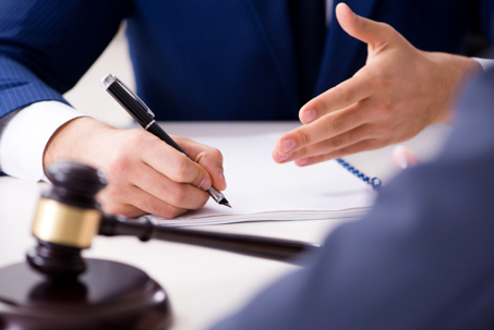 Lawyer talking to his client in office